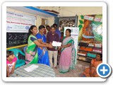 Mr. D. Siva Arun, Programme Assistant, ENVIS Centre distributing certificates and gifts to prize winner